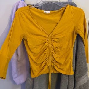 Yellow you can make it longer with the strings in the middle,comfortable wear